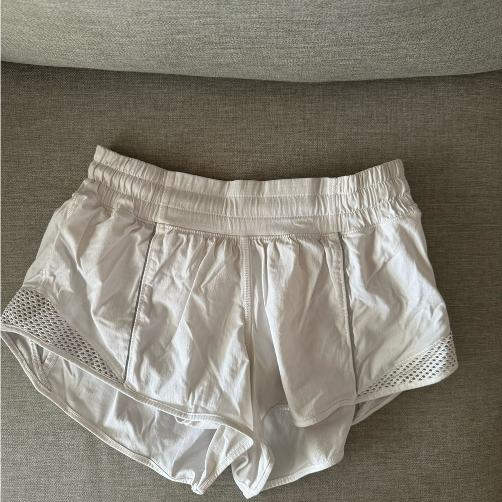 Lulemon white shorts- not sure of the style but hard to find. Metallic siding.